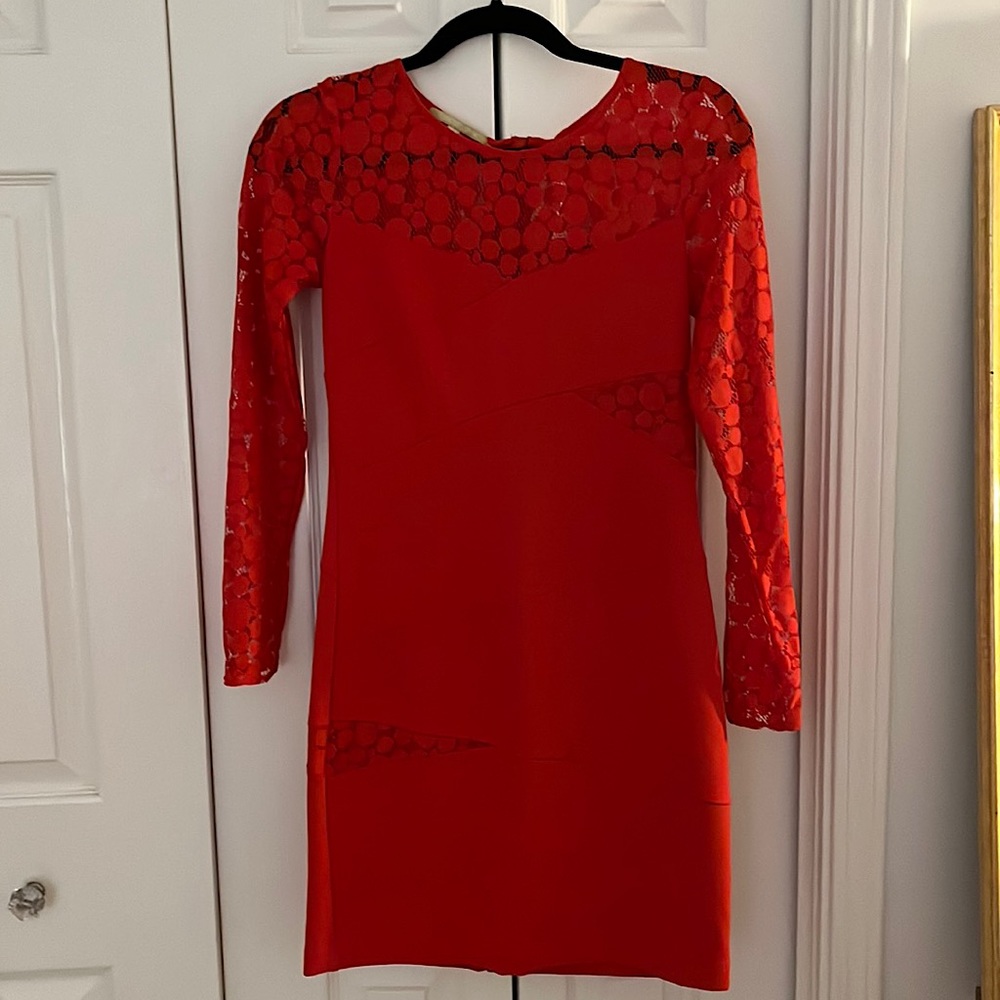 Gianni Bini Red dress with cutouts.